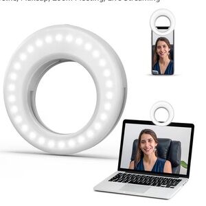 OlumiRing LED clip-on light. Brand new in box. - never used.